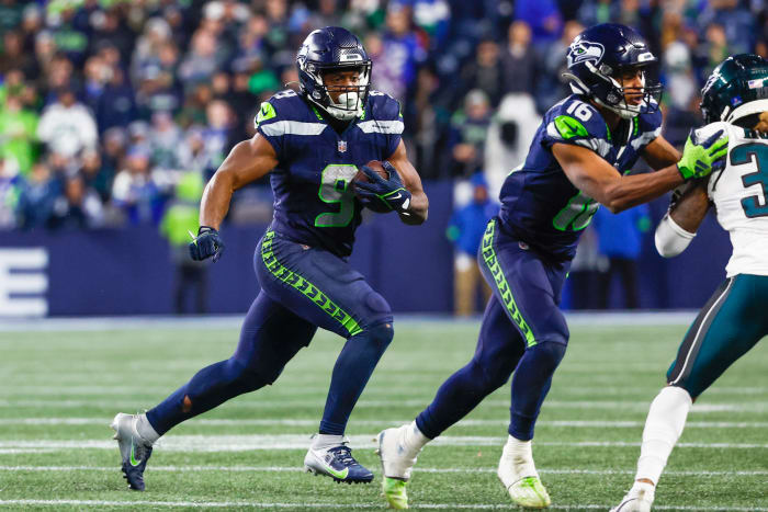 Dec 18, 2023; Seattle, Washington, USA; Seattle Seahawks running back Kenneth Walker III (9) rushes against the Philadelphia Eagles during the fourth quarter at Lumen Field.